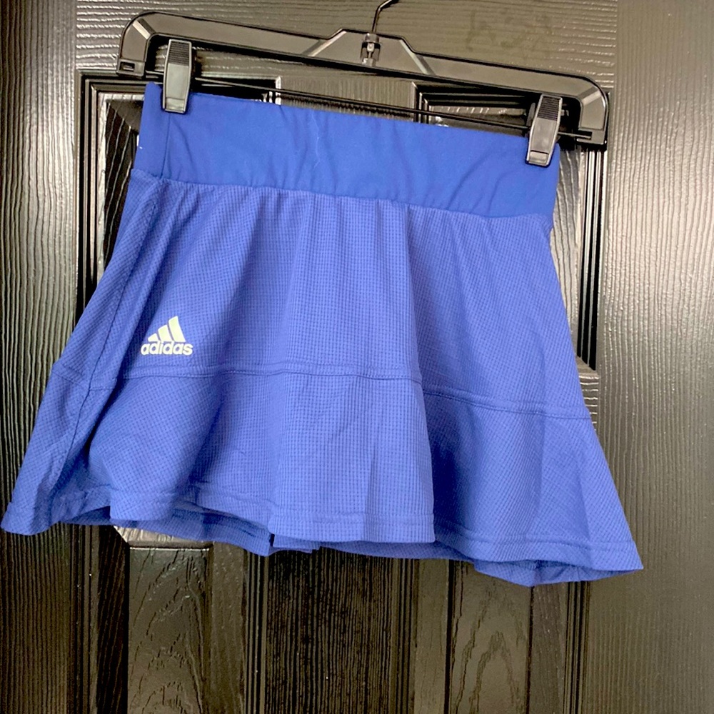Adidas tennis skirt with built in shorts. Size XS